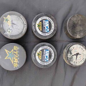 Vintage stars hockey pucks